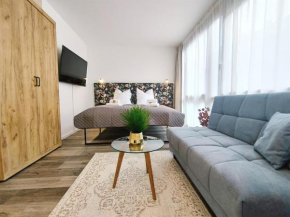 Design Apartment für bis zu 4 im 2 OG, modern, Dachterrasse, Grill, ruhige Lage, Disney plus, Wii, LAN und WLAN